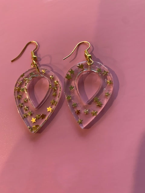 Star dangle earring with pointed end